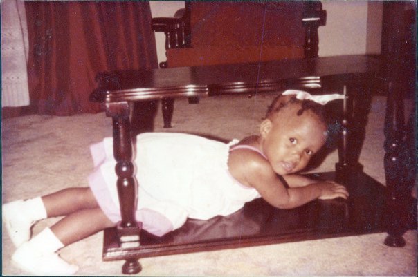 Baby Dana under coffee table